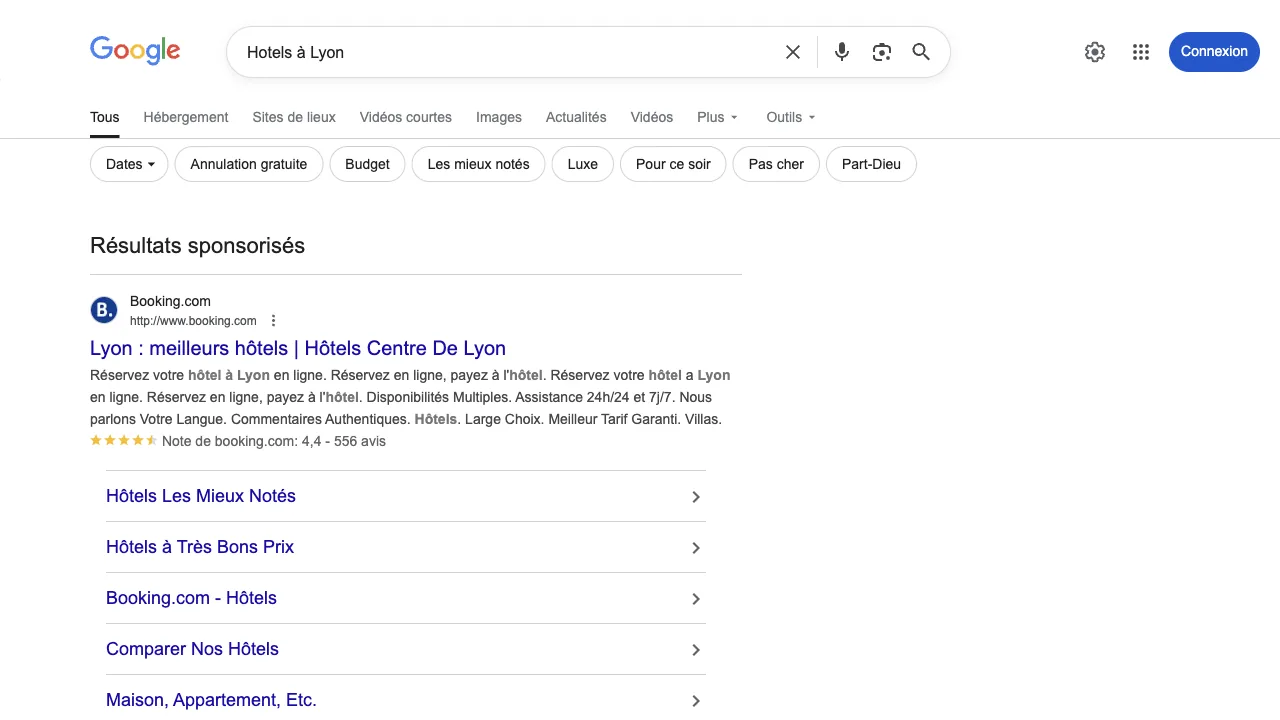 Capture Google Hotels à Lyon avec résultats sponsorisés et premiers liens